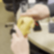 A person holds a model of a knee joint, demonstrating the movement with an emphasis on the femur, indicated by a red arrow and label.