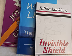 Three books with their titles, and name of author.