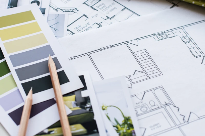 an image that shows a line drawing of a residential interior transforming into the finished, realised, three dimensional interior, represented in colour.