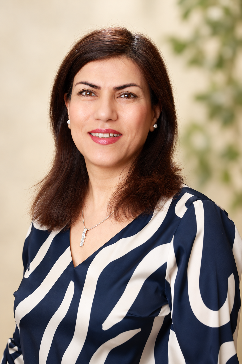 Masoumeh Pirhayati — Toddler Lead Teacher · Orange Butterfly