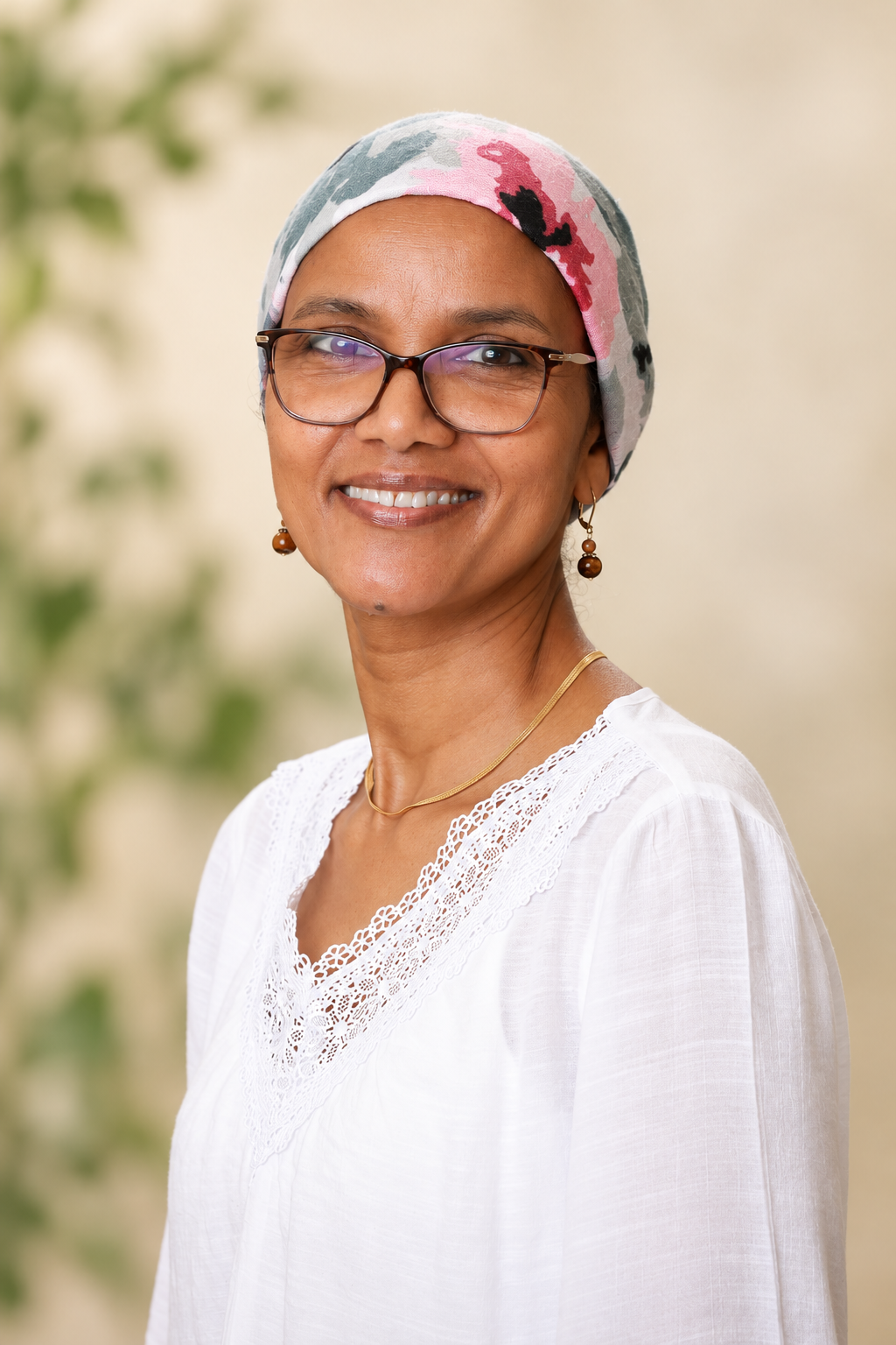 Manal Elawad — Infant/Toddler Teacher · Red Caterpillar