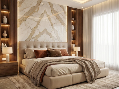 Elegant bedroom interior with marble accent wall, upholstered bed and warm lighting