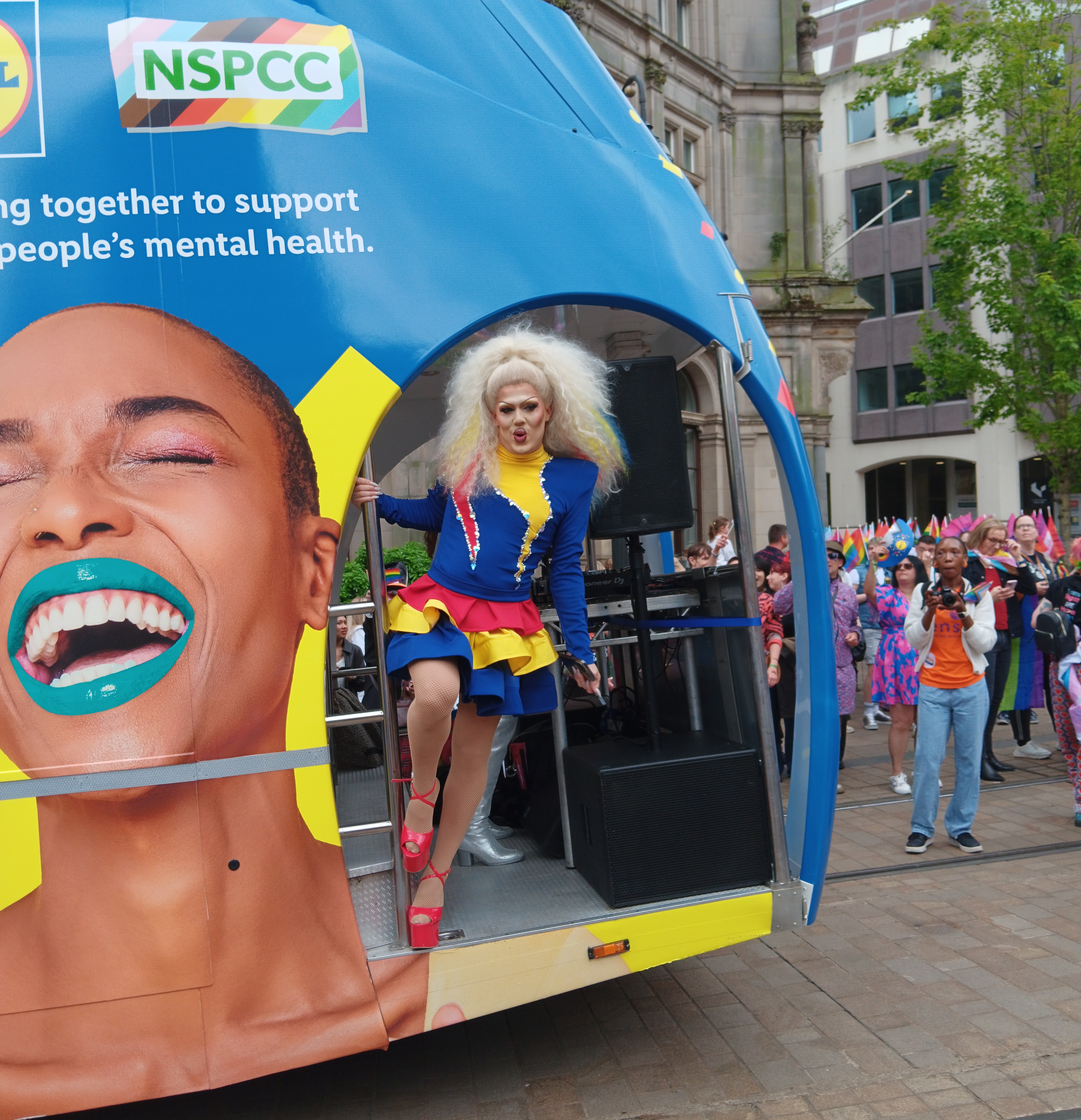 Elektra Fence drag queen on a bus
