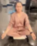 Person wearing FDH WEAR cotton-forward clothing in a calm home setting
