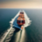 This image shows a large cargo ship, likely a container ship, sailing on the open ocean. H
