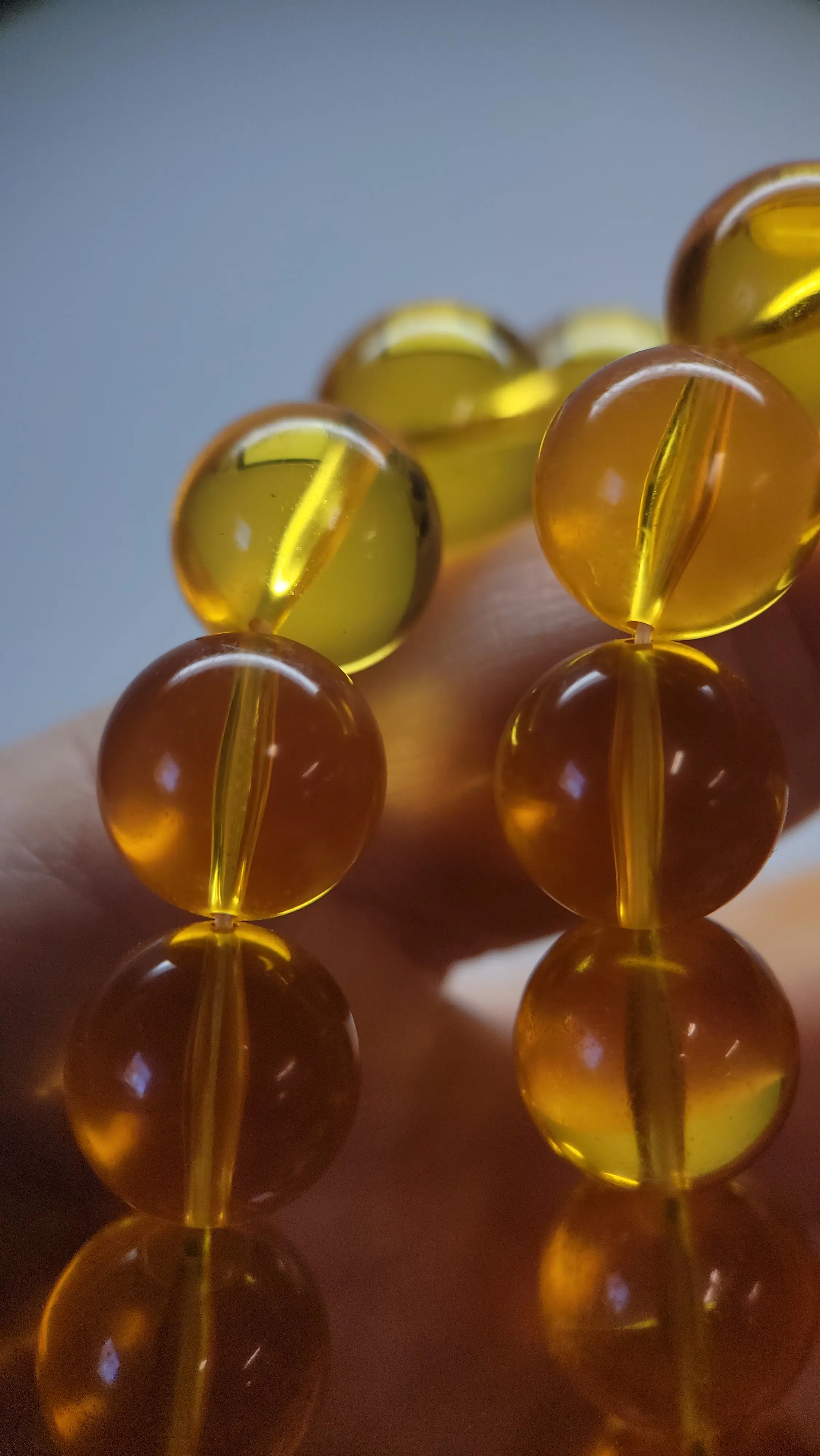 Plastic Necklace looks like AAA piece of amber