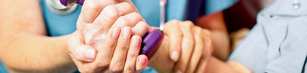 Healthcare professional assisting patien