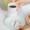 Thumbnail: slogan espresso cup and saucers set of 2 from yvonne ellen