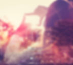 Hands framing vibrant city skyline