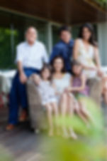 family-sitting-together-on-patio-picture-id135384903.jpg