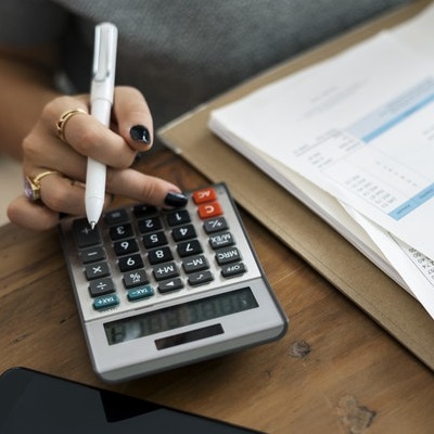 Hand operating calculator with papers