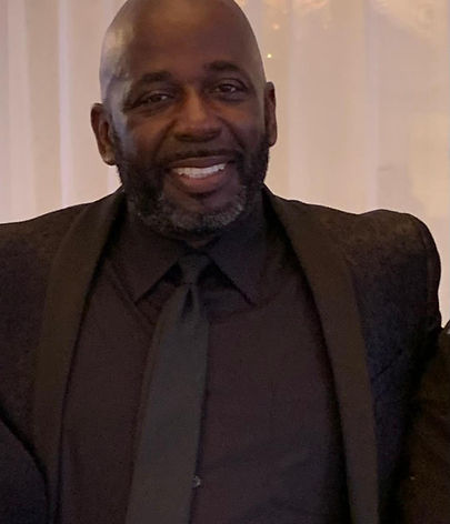KT in black suit.jpg