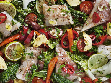 Fish with vegetables baked in foil