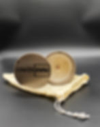 Light brown concrete large coffee scented candle inside view with lid brandishing Creatcrete logo