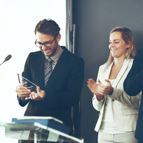 Man receiving an award