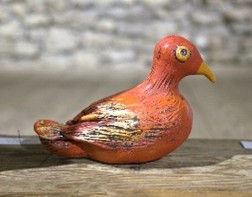 Oiseau rouge et jaune