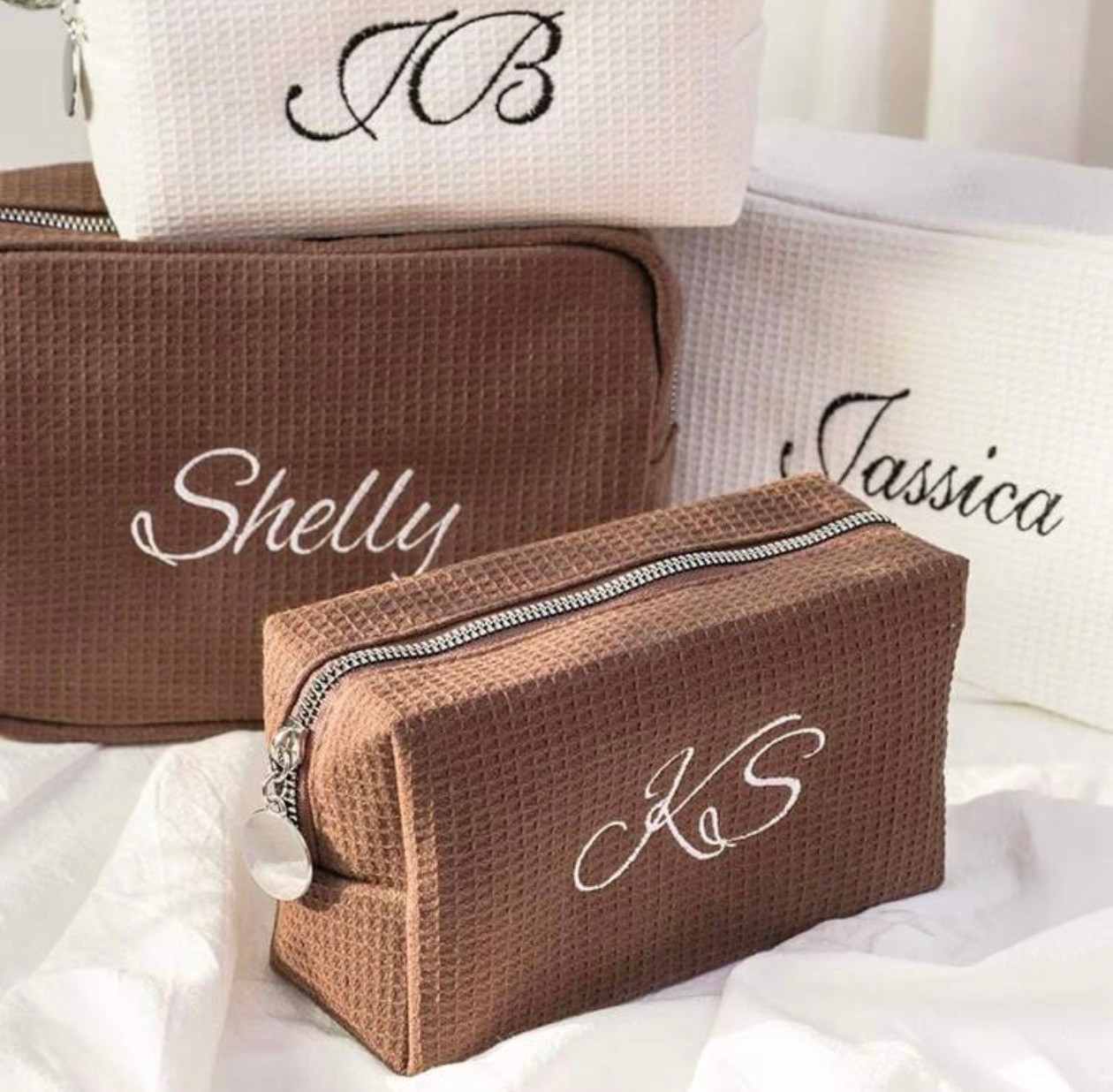 Monogram waffle makeup bag