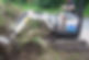 a man operating a small excavator