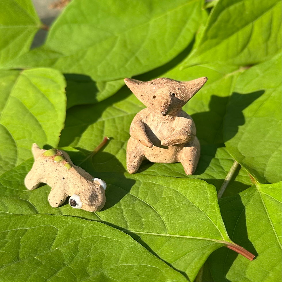 Thumbnail: sponk figurine