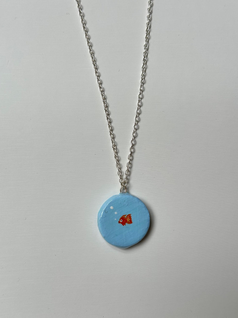 Thumbnail: goldfish bowl necklace