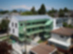 multi-family housing with green balconies
