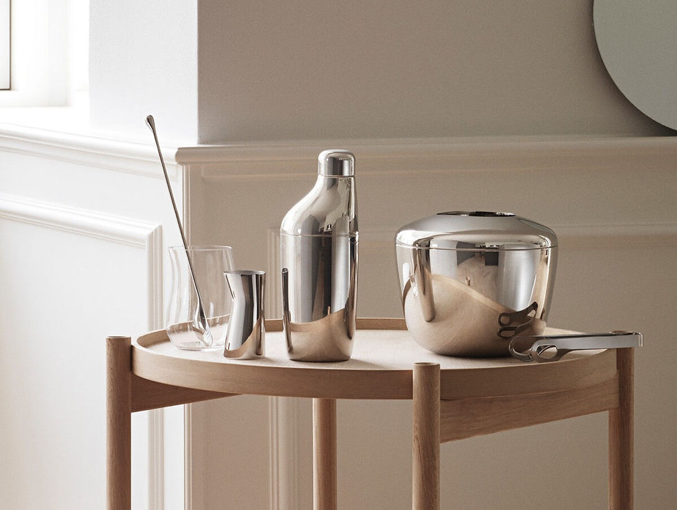 stainless steel shaker, jigger, bar spoon, ice bucket, and tongs
