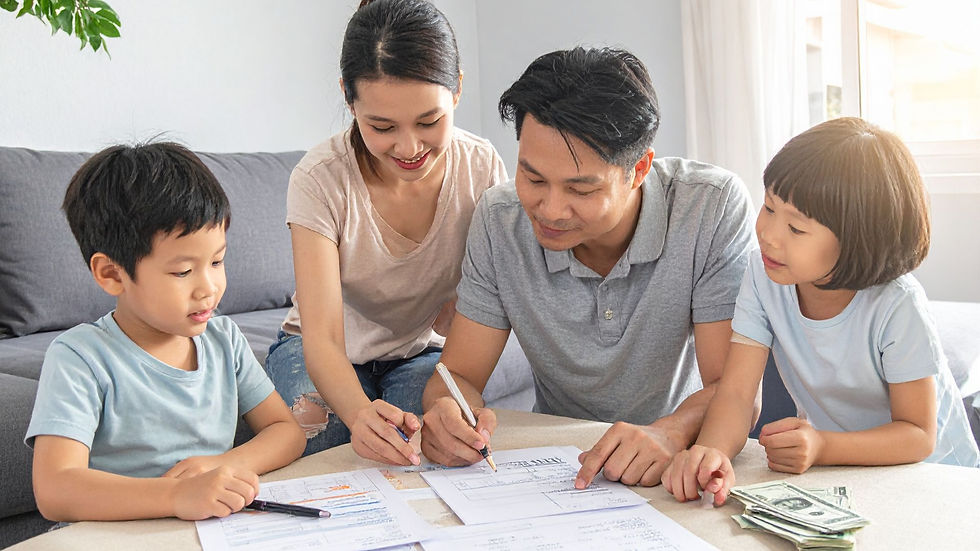 Family planning finances together at the beginning of the year.