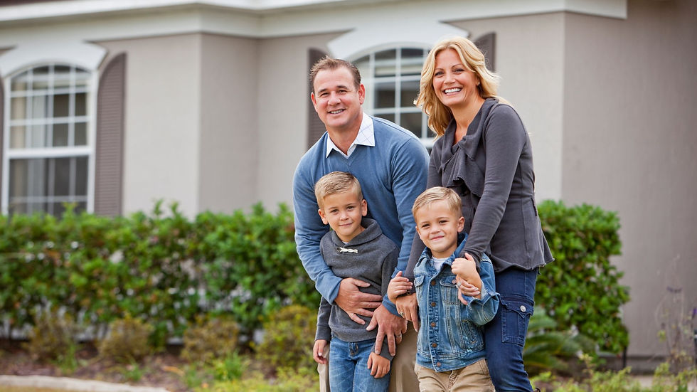 Ontario homeowner standing confidently in front of house after policy review.