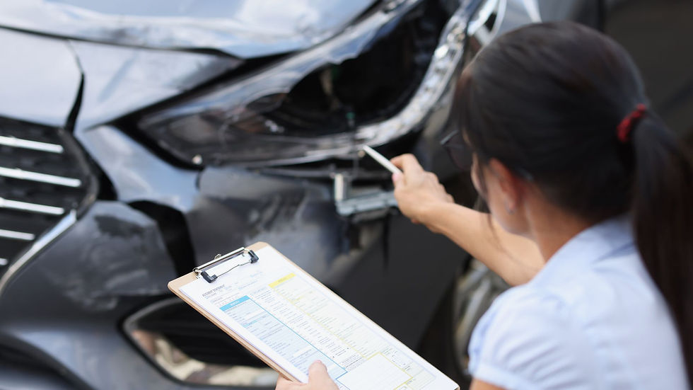 Ontario driver checking insurance documents in parked car.