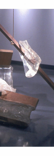 Stick Caught Cube and Water in Winter