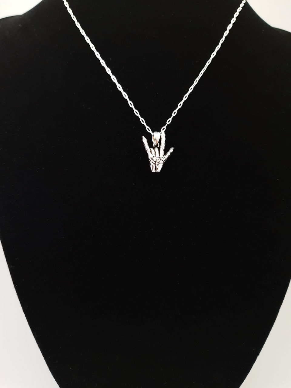 Thumbnail: Bone Hand Charm