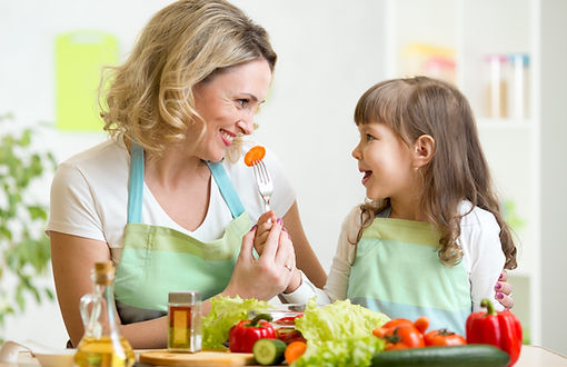 mother and daughter eating healthy