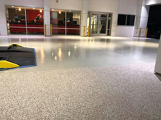 KIA Center Car Dealership Polyaspartic Flooring with Both Of Our Systems in Lakeland Florida