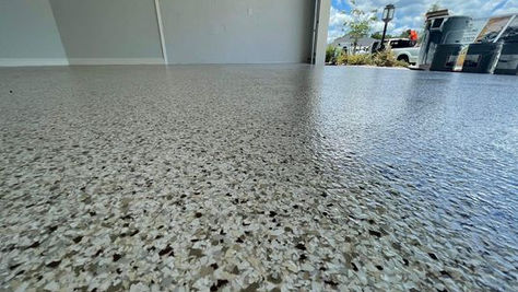 Rubber Garage Floor Mats vs. Tru Alpha NanoX Polyaspartic Garage Flooring: Which is Best for Your Garage?