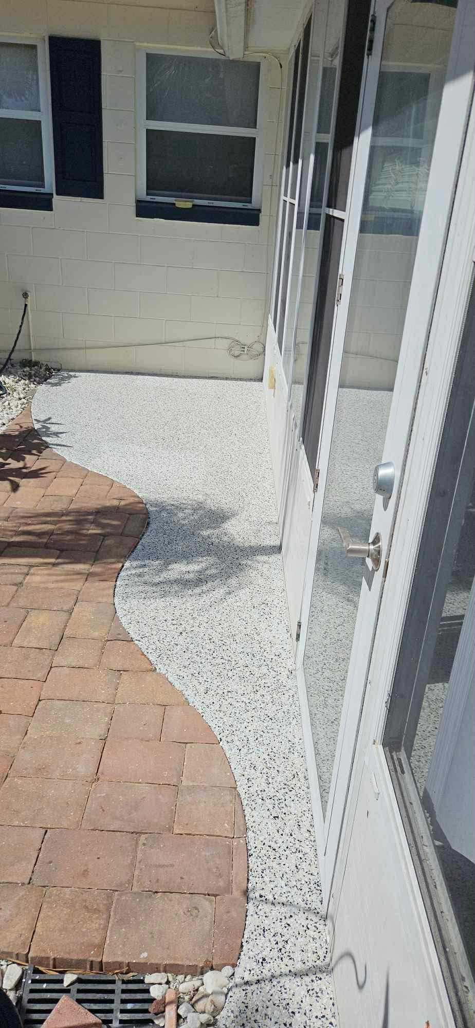 sting ray Polyaspartic patio and lanai resurfacing System with 100 percent coverage. outdoor side angle