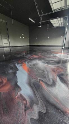 Professional installation of metallic epoxy flooring, ensuring a smooth and long-lasting surface.