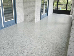 Tidalwave Patio and Lanai Polyaspartic Epoxy Flooring with two blue  french doors