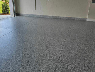 Tidal Wave Flake Blend Garage Floor Upgrade: Upgrade your garage floor with our Tidal Wave flake blend, featuring a blend of blue and white flakes that add depth and character, ensuring a stylish and resilient surface for years to come.