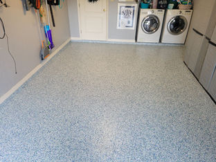 Sea Glass Flake Blend Garage Floor Detail: Discover the calming colors and smooth texture of our Sea Glass flake blend, designed to provide a resilient and visually appealing surface for garage floors, ensuring a serene and inviting atmosphere in your home.