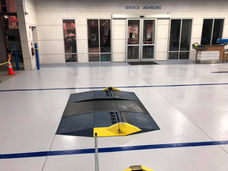 kia center lakeland solid pearl white epoxy with blue guidelines car parker