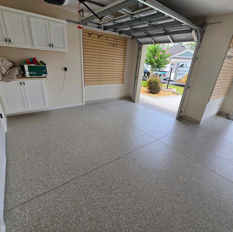 garage floor with our white swan blend that features a pristine composition of whites and light grey and beige tones with the 1 car area