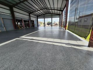 This polyaspartic floor coating is UV-resistant, ensuring the Bloom Grey blend remains vibrant even in Florida’s sunlight.