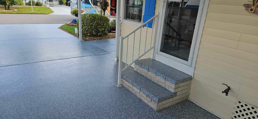 Epoxy flake driveway featuring a speckled pattern for enhanced aesthetics and slip resistance-blue-smokey
