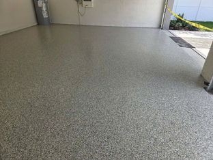 Tiger Shark Polyaspartic with UV Polymer in Central Florida 2 car garage flooring