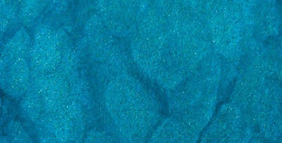 Turquoise metallic epoxy floor with tropical blue-green appearance