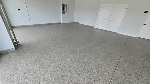 Creekbed Garage Flooring Polyaspartic Coating Side angle from the garage door opening
