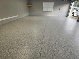 Cabin Fever Garage Polyaspartic Full Broadcast Flooring in Central Florida Side Angle
