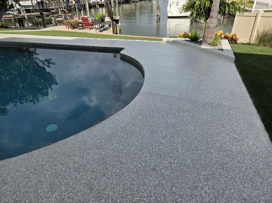 Luxury Polyaspartic Pool Deck With Tru FLake White Swan In Central Florida Close View