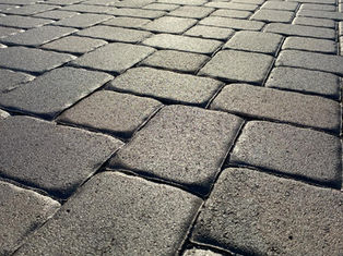 Paver Sealing Driveway in Central Florida at sunset