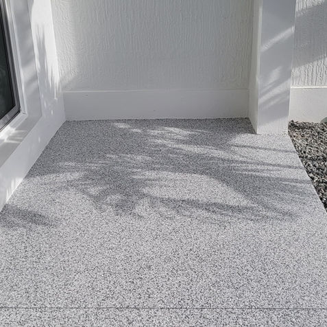 London Fog Flake Blend Walkway Detail: Explore the refined texture and color variation of our London Fog flake blend, designed to provide a durable and visually appealing surface for walkways, ensuring both style and functionality in any outdoor environment.